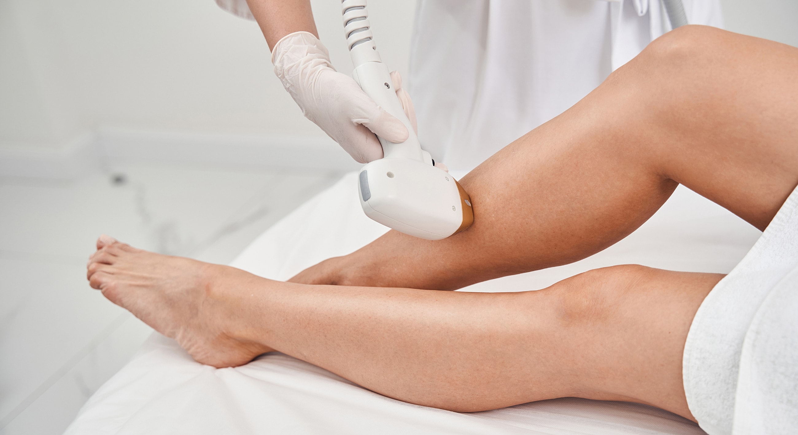 Laser hair removal treatment on leg.